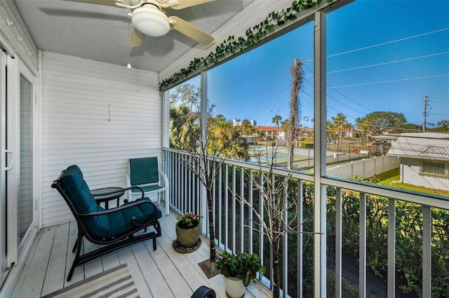 balcony featuring ceiling fan