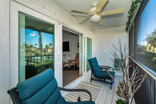 balcony featuring ceiling fan