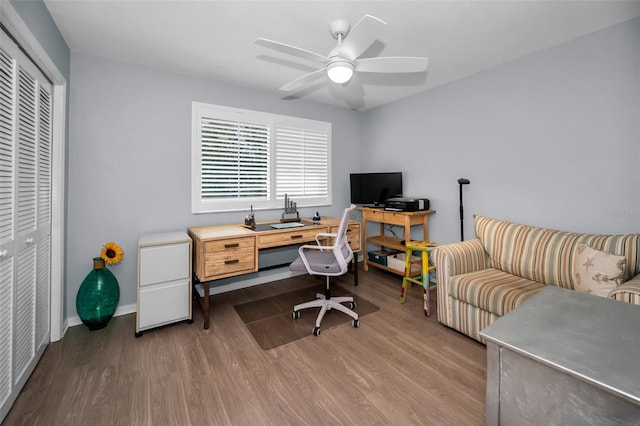 office space featuring hardwood / wood-style flooring and ceiling fan