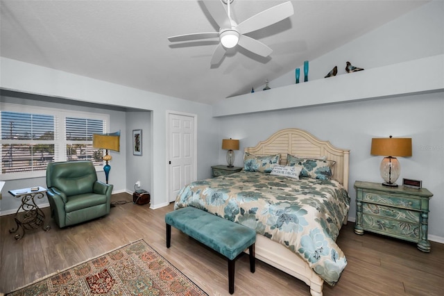 bedroom featuring lofted ceiling, hardwood / wood-style flooring, and ceiling fan