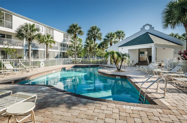 view of swimming pool featuring a patio