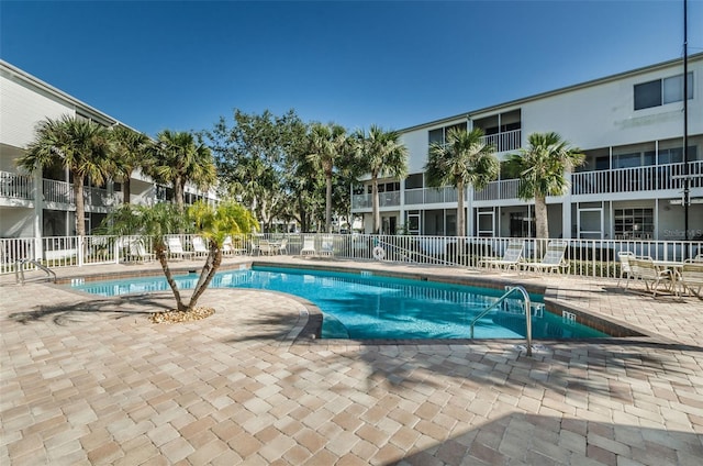 view of pool featuring a patio