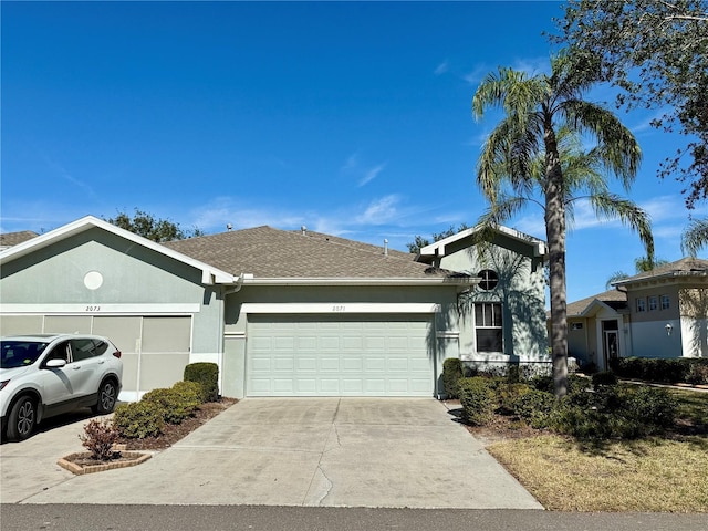 ranch-style house featuring a garage