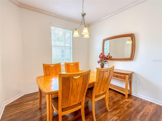 dining space featuring ornamental molding and dark hardwood / wood-style floors