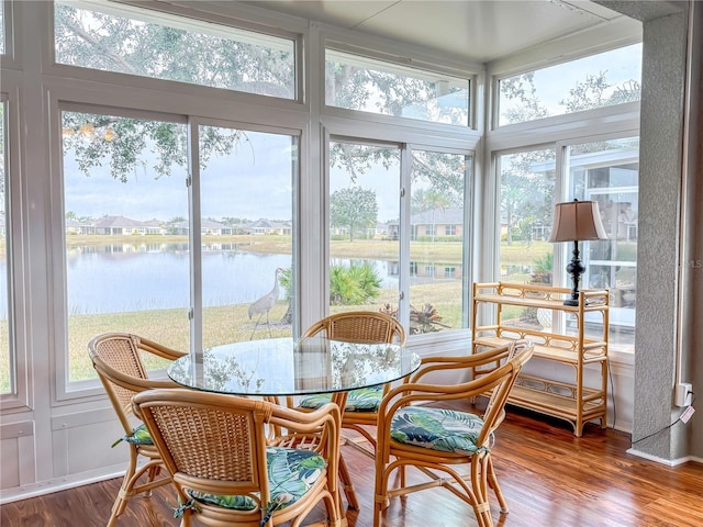 sunroom with a water view