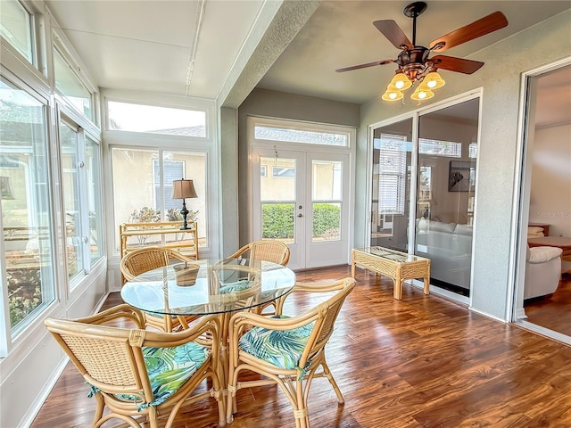 sunroom with ceiling fan and french doors