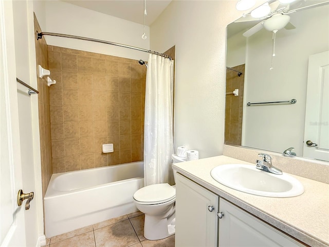 full bathroom with tile patterned flooring, vanity, shower / tub combo with curtain, and toilet