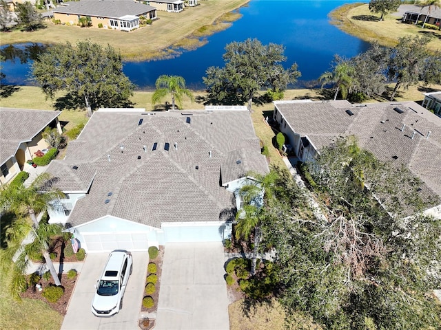 bird's eye view with a water view