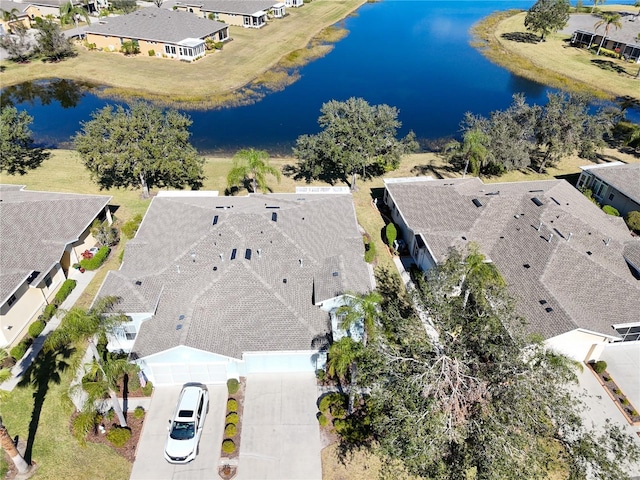 drone / aerial view featuring a water view