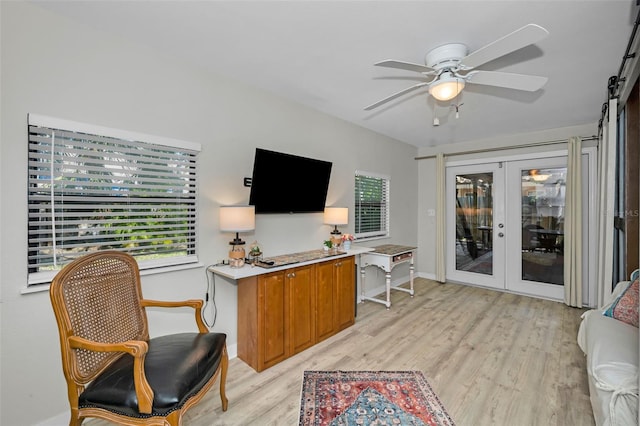 office area with french doors, ceiling fan, and light hardwood / wood-style flooring