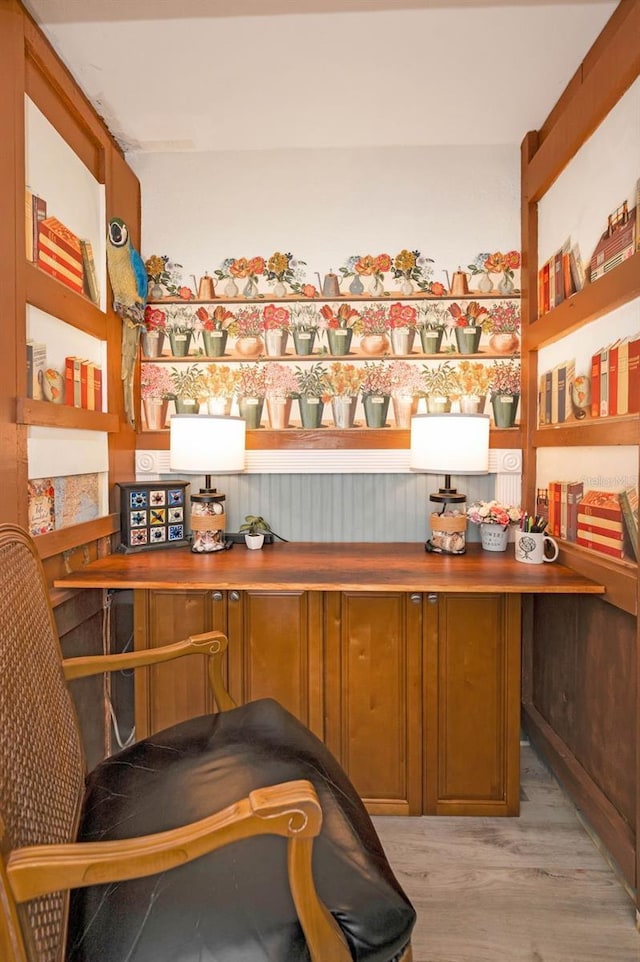 bar with light wood finished floors