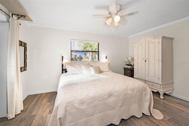 bedroom featuring ceiling fan, crown molding, baseboards, and wood finished floors