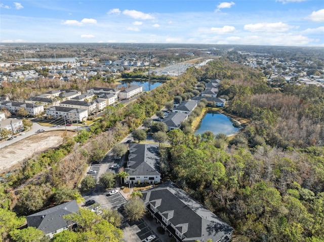 drone / aerial view with a water view