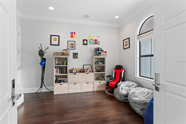 rec room with dark wood-style floors, crown molding, and recessed lighting