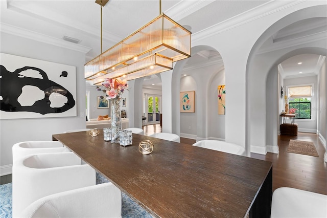 dining space featuring recessed lighting, wood finished floors, visible vents, baseboards, and crown molding