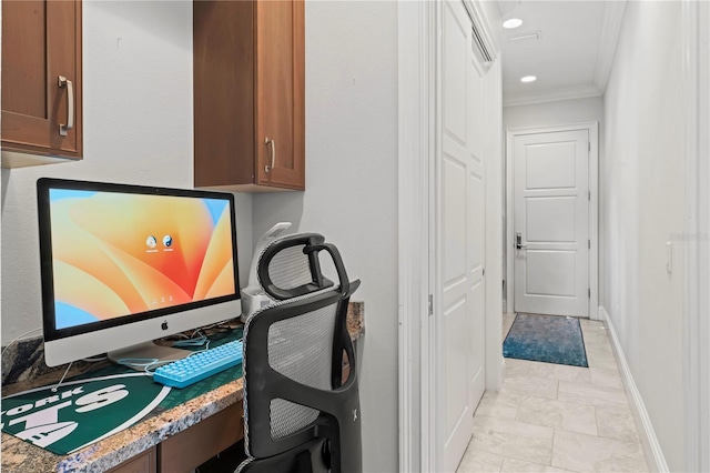 office area featuring baseboards, ornamental molding, built in study area, and recessed lighting