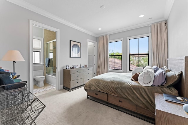 bedroom featuring recessed lighting, ensuite bath, ornamental molding, and light colored carpet