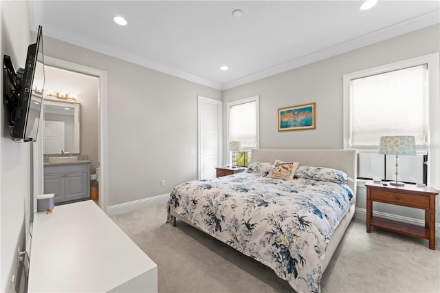 bedroom with ornamental molding, recessed lighting, light carpet, and baseboards