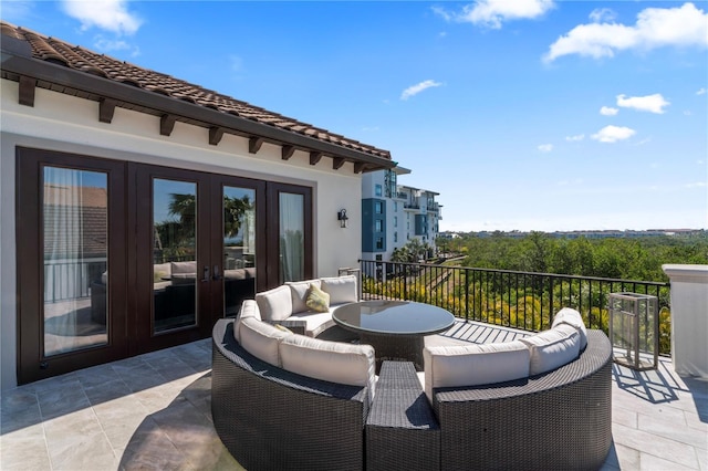 view of patio featuring outdoor lounge area and french doors