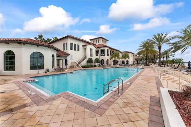 pool with a patio