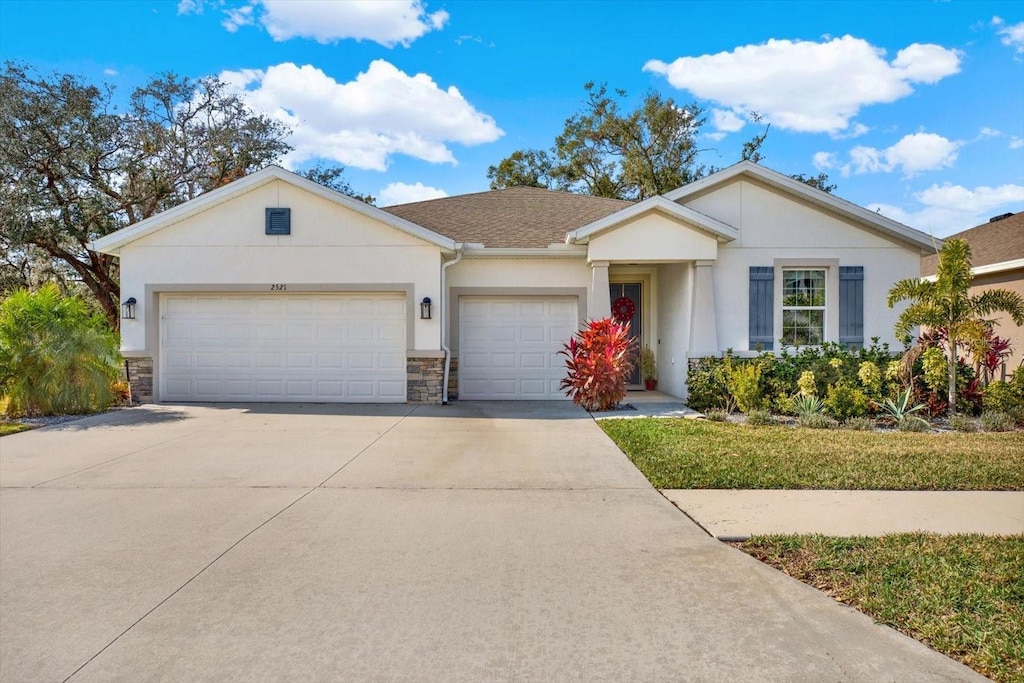 ranch-style home with a garage