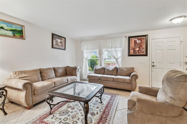 tiled living room with a textured ceiling