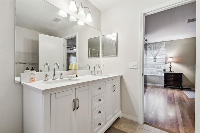 bathroom with vanity and ceiling fan