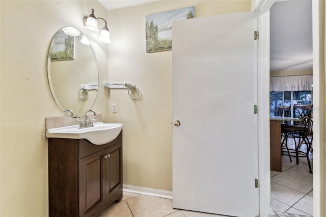 bathroom with vanity and tile patterned floors