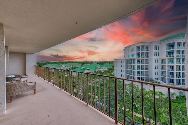 view of balcony at dusk