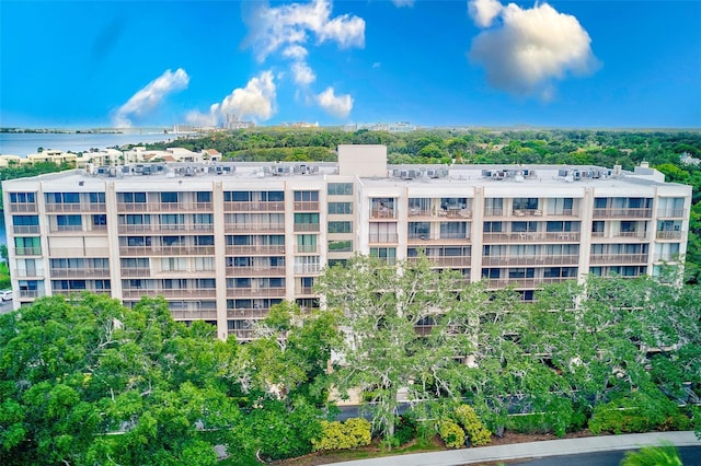 view of building exterior with a water view