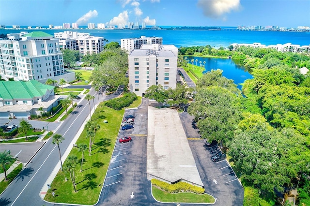 drone / aerial view with a water view