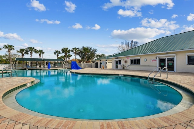 view of pool featuring a patio