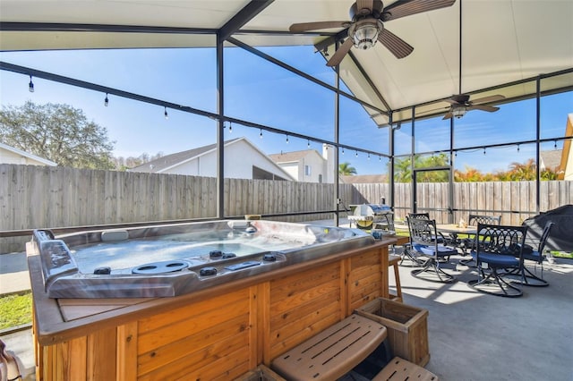 view of patio / terrace featuring a hot tub