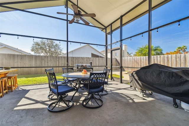 view of patio / terrace with a gazebo, area for grilling, and ceiling fan