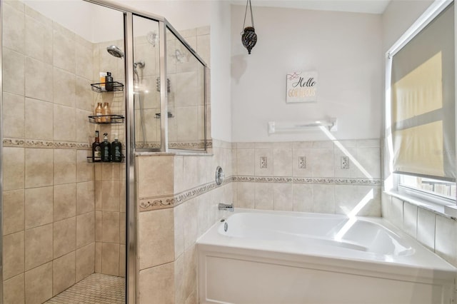 bathroom featuring plus walk in shower