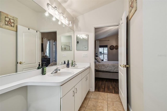 bathroom featuring tile patterned floors and vanity