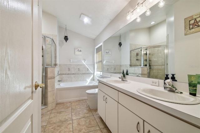 full bathroom featuring tile patterned floors, lofted ceiling, toilet, and shower with separate bathtub