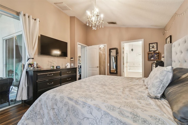 bedroom with vaulted ceiling, dark wood-type flooring, connected bathroom, and a notable chandelier