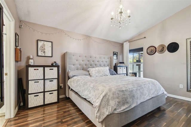 bedroom featuring vaulted ceiling, dark wood-type flooring, a notable chandelier, and a textured ceiling