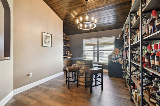 dining space featuring wooden ceiling, dark hardwood / wood-style flooring, vaulted ceiling, and a notable chandelier