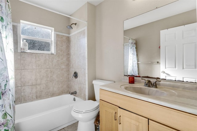 full bathroom featuring vanity, tile patterned floors, toilet, and shower / bath combo