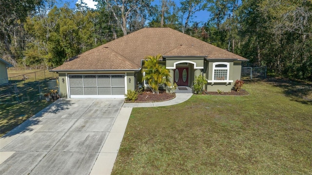 ranch-style house with a garage and a front lawn