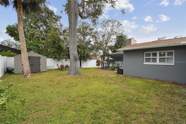 view of yard featuring a storage shed