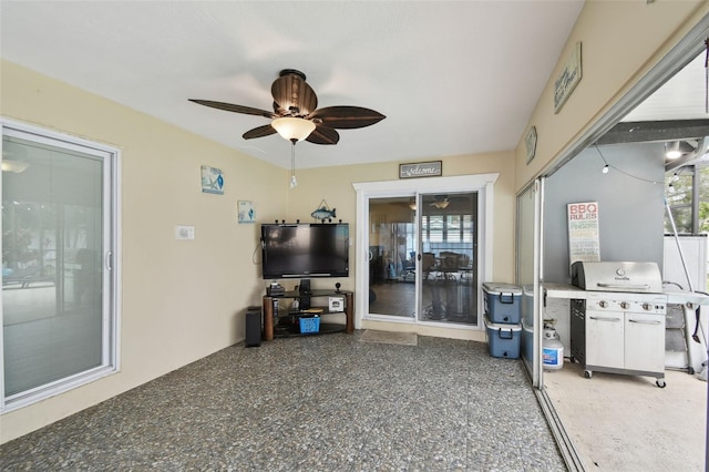 living room featuring ceiling fan