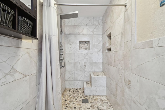 bathroom with a shower with shower curtain