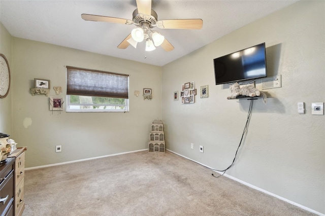 bedroom with light colored carpet and ceiling fan