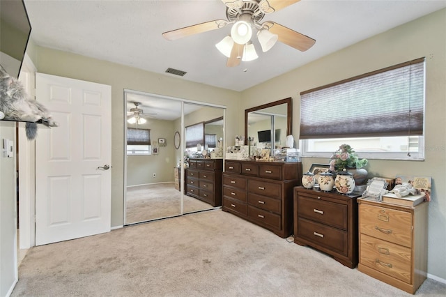 bathroom featuring ceiling fan and vanity