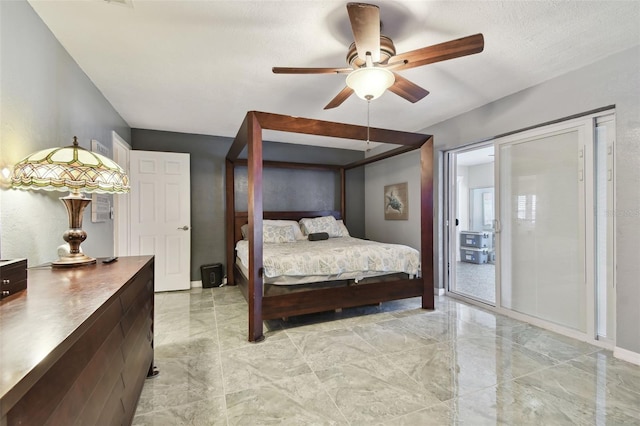 bedroom featuring ceiling fan