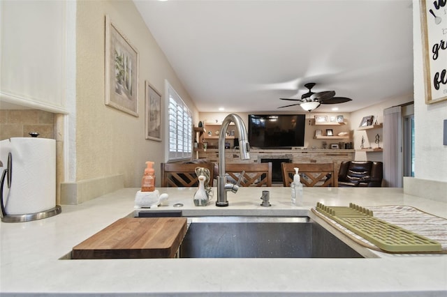 kitchen with sink and ceiling fan