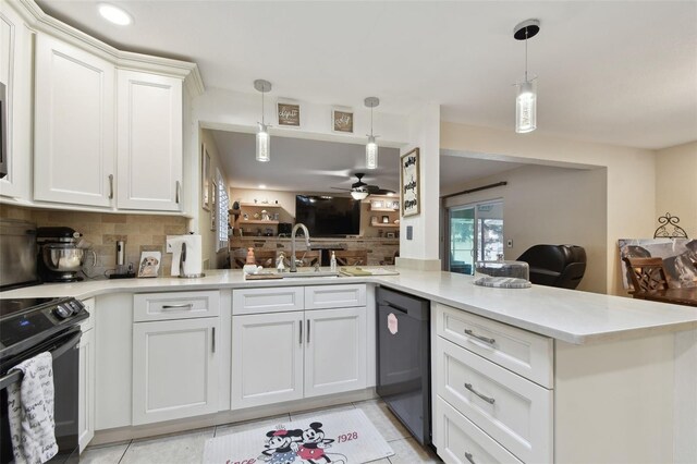 kitchen featuring white cabinetry, decorative light fixtures, kitchen peninsula, and black appliances